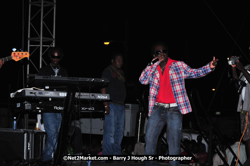 Lucea Cross the Harbour @ Lucea Car Park - All Day Event - Cross the Harbour Swim, Boat Rides, and Entertainment for the Family - Concert Featuring: Bushman, George Nooksl, Little Hero, Bushi One String, Dog Rice and many local Artists - Friday, August 1, 2008 - Lucea, Hanover Jamaica - Photographs by Net2Market.com - Barry J. Hough Sr. Photojournalist/Photograper - Photographs taken with a Nikon D300 - Negril Travel Guide, Negril Jamaica WI - http://www.negriltravelguide.com - info@negriltravelguide.com...!