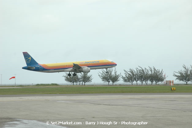 Air Jamaica Airline - Landing & Take Off - MBJ Airports Limited - Sangster International Airport - Domestic Terminal - Montego Bay, St James, Jamaica W.I. - MBJ Limited - Transforming Sangster International Airport into a world class facility - Photographs by Net2Market.com - Negril Travel Guide, Negril Jamaica WI - http://www.negriltravelguide.com - info@negriltravelguide.com...!