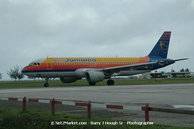 Air Jamaica Airline - Landing & Take Off - MBJ Airports Limited - Sangster International Airport - Domestic Terminal - Montego Bay, St James, Jamaica W.I. - MBJ Limited - Transforming Sangster International Airport into a world class facility - Photographs by Net2Market.com - Negril Travel Guide, Negril Jamaica WI - http://www.negriltravelguide.com - info@negriltravelguide.com...!