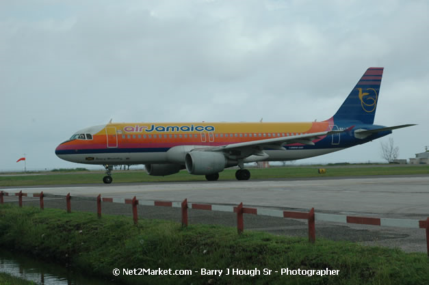 Air Jamaica Airline - Landing & Take Off - MBJ Airports Limited - Sangster International Airport - Domestic Terminal - Montego Bay, St James, Jamaica W.I. - MBJ Limited - Transforming Sangster International Airport into a world class facility - Photographs by Net2Market.com - Negril Travel Guide, Negril Jamaica WI - http://www.negriltravelguide.com - info@negriltravelguide.com...!