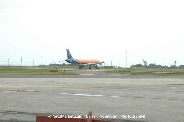 Air Jamaica Airline - Landing & Take Off - MBJ Airports Limited - Sangster International Airport - Domestic Terminal - Montego Bay, St James, Jamaica W.I. - MBJ Limited - Transforming Sangster International Airport into a world class facility - Photographs by Net2Market.com - Negril Travel Guide, Negril Jamaica WI - http://www.negriltravelguide.com - info@negriltravelguide.com...!