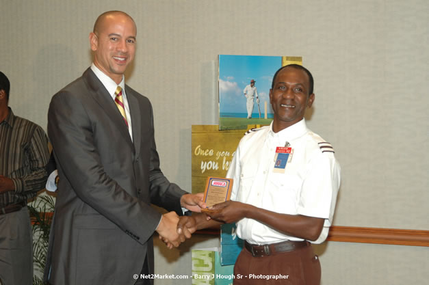 Red Cap Porters Awards - Minister of Tourism, Hon. Edmund Bartlett - Director of Tourism, Basil Smith - Friday, December 14, 2007 - Holiday Inn Sunspree, Montego Bay, Jamaica W.I. - Photographs by Net2Market.com - Barry J. Hough Sr, Photographer - Negril Travel Guide, Negril Jamaica WI - http://www.negriltravelguide.com - info@negriltravelguide.com...!