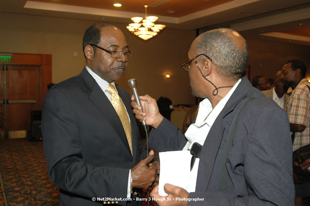 Red Cap Porters Awards - Minister of Tourism, Hon. Edmund Bartlett - Director of Tourism, Basil Smith - Friday, December 14, 2007 - Holiday Inn Sunspree, Montego Bay, Jamaica W.I. - Photographs by Net2Market.com - Barry J. Hough Sr, Photographer - Negril Travel Guide, Negril Jamaica WI - http://www.negriltravelguide.com - info@negriltravelguide.com...!