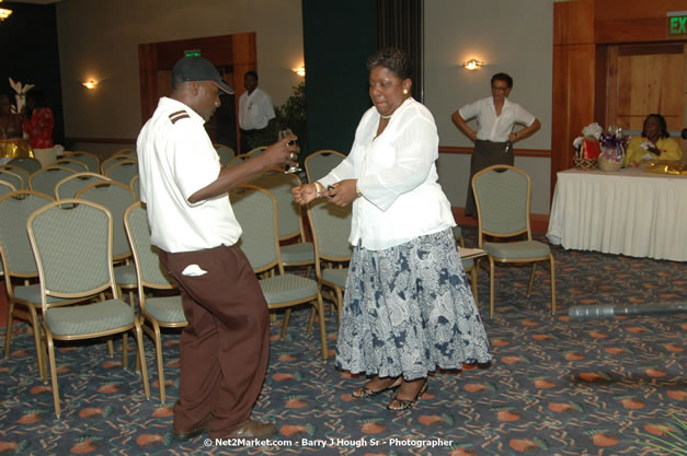 Red Cap Porters Awards - Minister of Tourism, Hon. Edmund Bartlett - Director of Tourism, Basil Smith - Friday, December 14, 2007 - Holiday Inn Sunspree, Montego Bay, Jamaica W.I. - Photographs by Net2Market.com - Barry J. Hough Sr, Photographer - Negril Travel Guide, Negril Jamaica WI - http://www.negriltravelguide.com - info@negriltravelguide.com...!