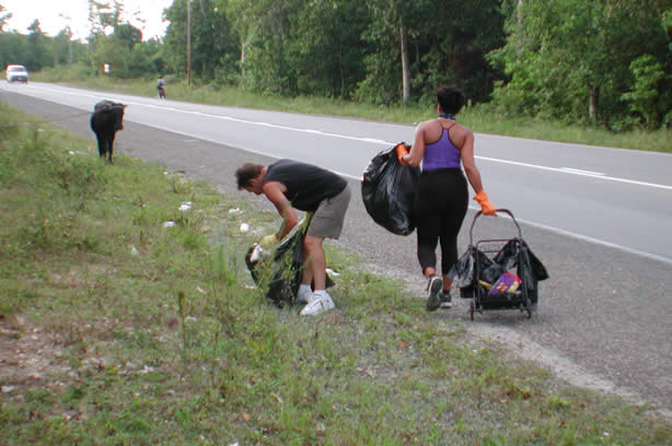 Volunteers Clean-Up Roadside Entrance to Negril - Negril Travel Guide