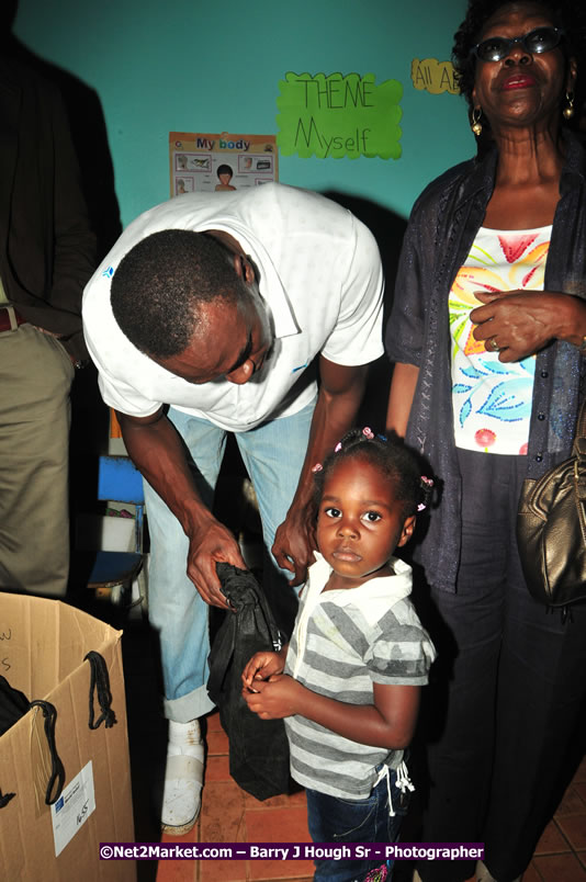 Usain Bolt of Jamaica - The Fastest Man In The World  - Usain Bolt Homecoming Celebrations - Press Conference at the Grand Bahia Principe &amp; Sherwood Content - Waldensia Primary School - Photographs by Net2Market.com - Barry J. Hough Sr. Photojournalist/Photograper - Photographs taken with a Nikon D300 - Negril Travel Guide, Negril Jamaica WI - http://www.negriltravelguide.com - info@negriltravelguide.com...!