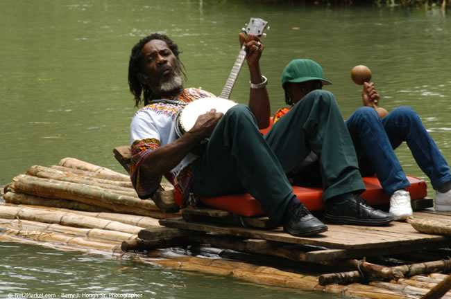 Rafting on the Martha Brae - Virgin Atlantic Inaugural Flight To Montego Bay, Jamaica Photos - Sir Richard Bronson, President & Family, and 450 Passengers - Rafting on the Martha Brae - Tuesday, July 4, 2006 - Negril Travel Guide, Negril Jamaica WI - http://www.negriltravelguide.com - info@negriltravelguide.com...!